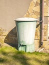 Large plastic water tank with tap in the garden Royalty Free Stock Photo
