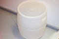 Large plastic white barrel of high-pressure polyethylene. Plastic production