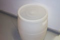 Large plastic white barrel of high-pressure polyethylene. Plastic production