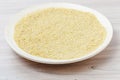 Large plate of raw Golden bulgur Royalty Free Stock Photo