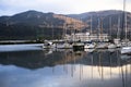 Large pleasure boat and yachts and small boats in the Columbia River bay at Hood River Royalty Free Stock Photo