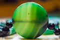 Large polished beads of beautiful translucent green agate gemstone, macro