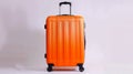 The large polycarbonate suitcase is isolated on a white background. The travel suitcase is isolated on a white Royalty Free Stock Photo