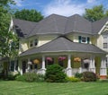 Large porch with hanging baskets