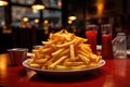 Large portion of french fries on plate Royalty Free Stock Photo