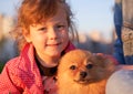 Large portrait of adorable little girl with doggie