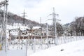 large power plant in the mountains covered with snow