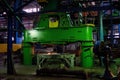 Large pressing machine in the industrial shop forging plant. Production machines, equipment and heavy iron stamping in the industr