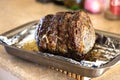 A large prime rib beef roast that was baked and roasted in the oven by a home gourmet chef for a holiday Christmas Royalty Free Stock Photo