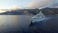 Large private super motor yacht underway in the ocean