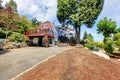 Large property with blue house and deck.