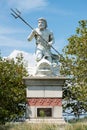 A large public statue of King Neptune that welcomes all to Atlantic City Aquarium in New Jersey