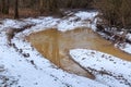 Large puddle on the rural road.