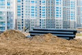 Large PVC pipes stacked at construction site in Sintanjin Dong Royalty Free Stock Photo