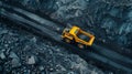 Large quarry dump truck. Big yellow mining truck at work site. Loading coal into body truck. Production useful minerals Royalty Free Stock Photo