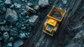 Large quarry dump truck. Big yellow mining truck at work site. Loading coal into body truck. Production useful minerals Royalty Free Stock Photo