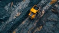 Large quarry dump truck. Big yellow mining truck at work site. Loading coal into body truck. Production useful minerals Royalty Free Stock Photo