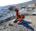 Large quarry dump truck. Loading the rock in the dumper. Loading coal into body work truck Royalty Free Stock Photo