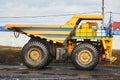 Large quarry dump truck. Mining truck mining machinery to transport coal from open-pit production