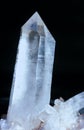 Large quartz rock crystal black background Royalty Free Stock Photo
