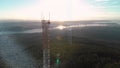 Large radio cell towers overlooking Vancouver with radiowave and data overlay animation. 4K 24FPS.