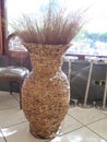 Large raffia vase