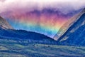 Large rainbow wall across the west Maui mountains. Royalty Free Stock Photo