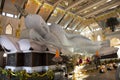 Large reclining Buddha marble statue for people and travelers travel visit and respect praying at Wat pa phu kon temple on Royalty Free Stock Photo