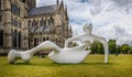 Large Reclining Figure sculpture by Henry Moore outside Salisbury Cathedral in Salisbury, Wiltshire, UK