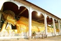 Large Reclining Golden Buddha Image at Wat Somdej Temple in Sangkhlaburi, Thailand Royalty Free Stock Photo