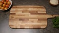 A large rectangular wooden cutting board