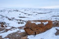 Large red boulders at Red Rock Coulee, Alberta, in winter Royalty Free Stock Photo