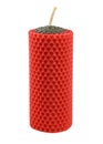 Large red handmade candle made of natural wax sheet. Royalty Free Stock Photo