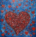 A large red heart is surrounded by smaller red, white and black hearts on a blue background. The image of the heart seems to be