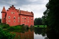 Large red house on lake Royalty Free Stock Photo