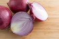 Large red onions on cutting board Royalty Free Stock Photo