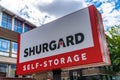 A large red and white Shurgard Self storage sign outside the Norbury storage warehouse