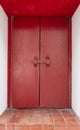 Large red wooden door. The old vintage retro door made of hardwood Royalty Free Stock Photo