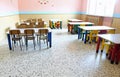Large refectory of kindergarten with small tables and chairs Royalty Free Stock Photo