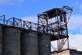 Large reinforced concrete pipe construction with a metal ladder against a bright blue sky Royalty Free Stock Photo