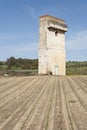 Large reservoir of water to pump crops into a rain-fed tillage field