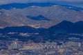 Large Residential Apartment Complex between Sprawling City and Mountains