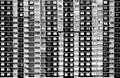 Large residential building with many windows in black and white Royalty Free Stock Photo