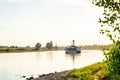 Large retro tourist steamer with a pipe sails along the calm Elbe river Royalty Free Stock Photo