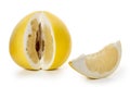 Large ripe pomelo fruit with a carved piece on a white background. Full depth of field. Royalty Free Stock Photo