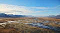 Expansive Landscape: A River On A Flat Field