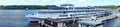 Russia, Uglich, July 2020. Panorama of the Volga River and a passenger ship at the pier.