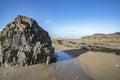 Large rock on Bude beach Royalty Free Stock Photo