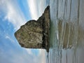 Large rock formation in sea