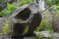 Large rock with a hole in the Indonesian forest Royalty Free Stock Photo